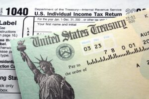 Tax refund check from the IRS representing how to spend your tax refund wisely